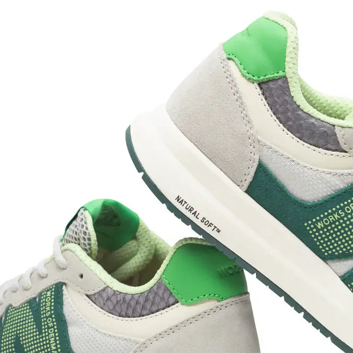 Woden I Rigmor open mesh dames sneakers in appelgroen met ademend mesh-design en duurzame materialen.