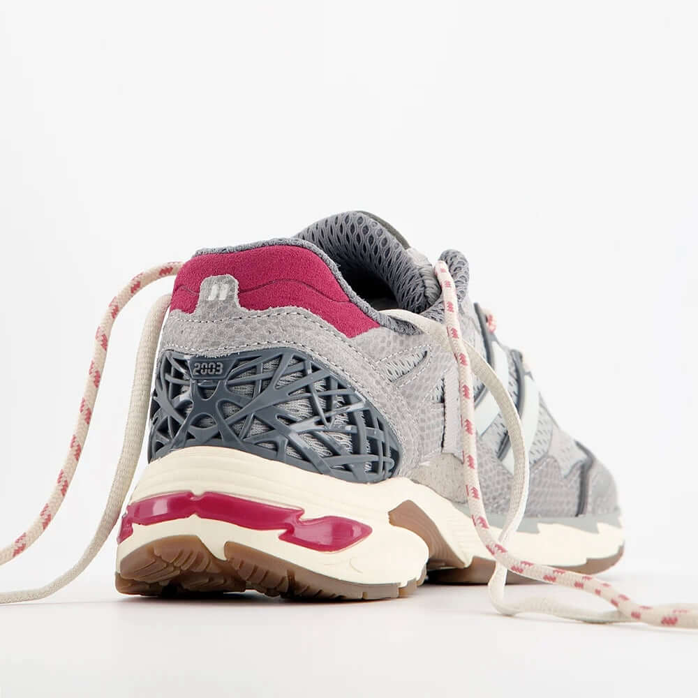 A close-up view of the Coolway I 2003 GHY sneakers showcasing their retro design and modern details.