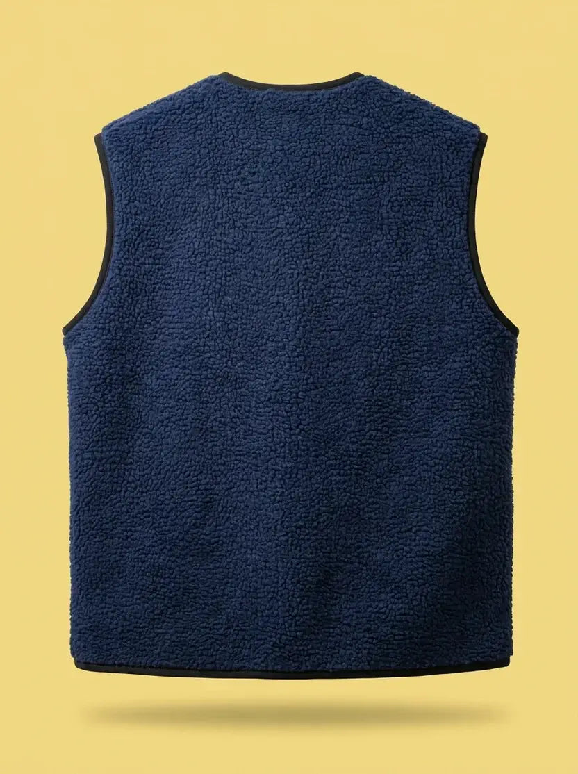 Achterkant van de Wiggy's Supply OG Bodywarmer in navy kleur, perfect voor casual outfits.