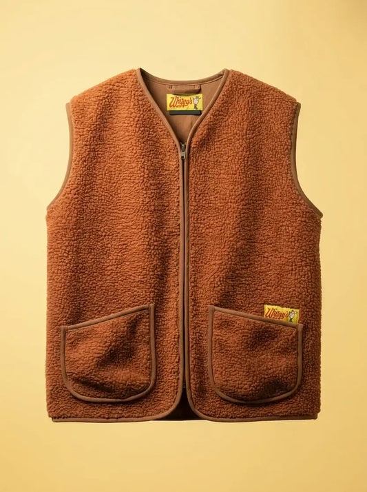 Wiggy’s Supply OG Bodywarmer mocca met een stoer ontwerp en handige zakken, perfect voor straatmode en comfort.