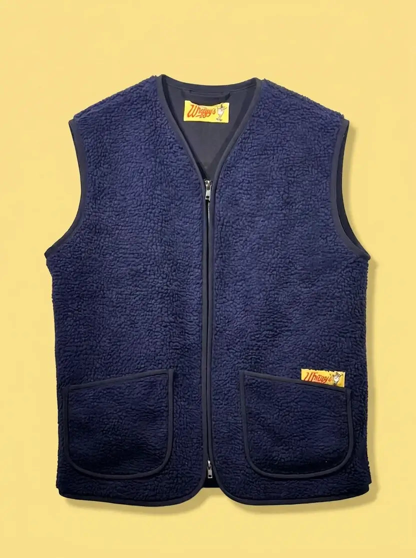 Bodywarmer van Wiggy's Supply in navy kleur met twee zakken en ritssluiting.