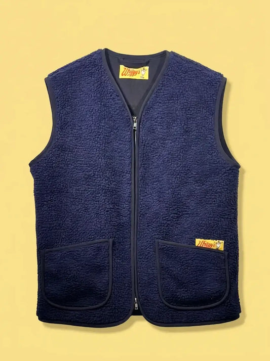 Bodywarmer van Wiggy's Supply in navy kleur met twee zakken en ritssluiting.